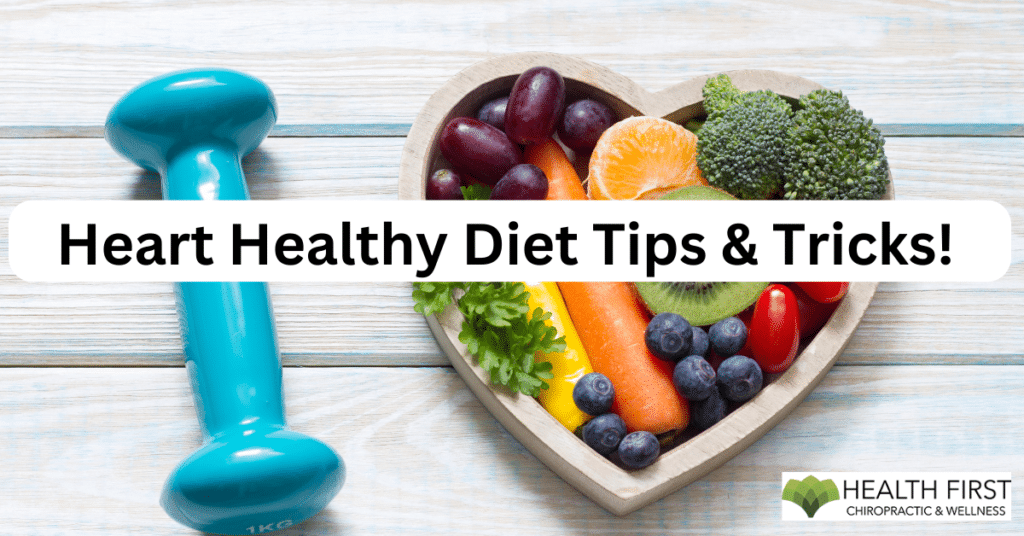 A heart-shaped bowl filled with colorful fruits and vegetables, next to a blue dumbbell, promoting heart-healthy diet tips.