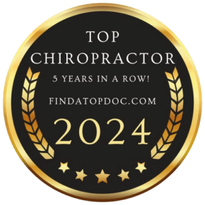 Award badge for "Top Chiropractor 2024," recognized for excellence for five consecutive years, from findatopdoc.com.