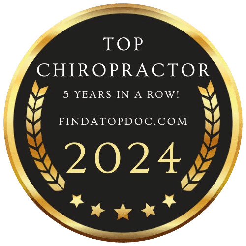 Award badge for "Top Chiropractor 2024," recognized for excellence for five consecutive years, from findatopdoc.com.
